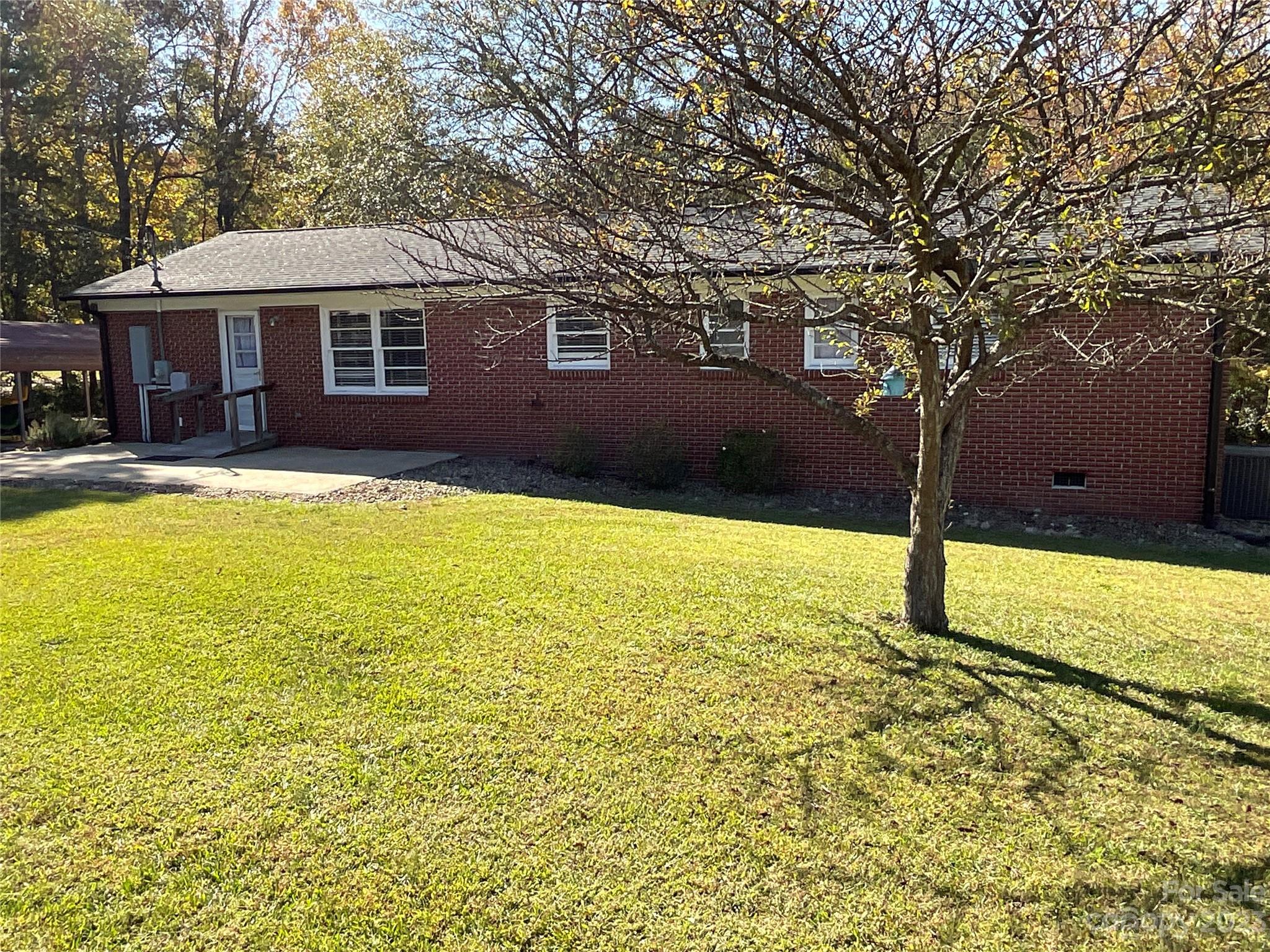 1285 Rainbow Circle Catawba, SC 29704 - Photo 19 of 22 a front view of a house with a yard