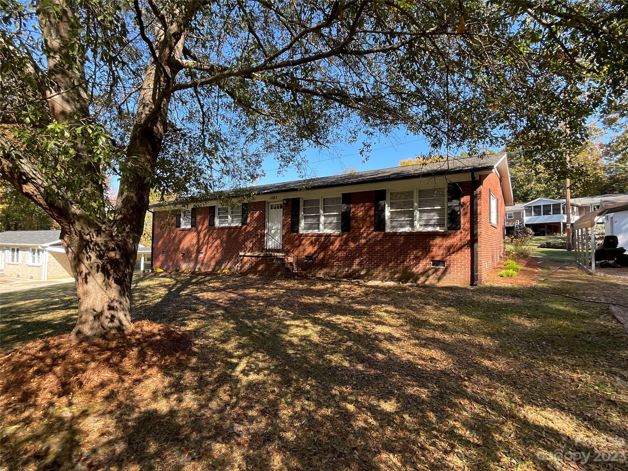1285 Rainbow Circle Catawba, SC 29704 - Photo 2 of 22 a view of a house with large tree