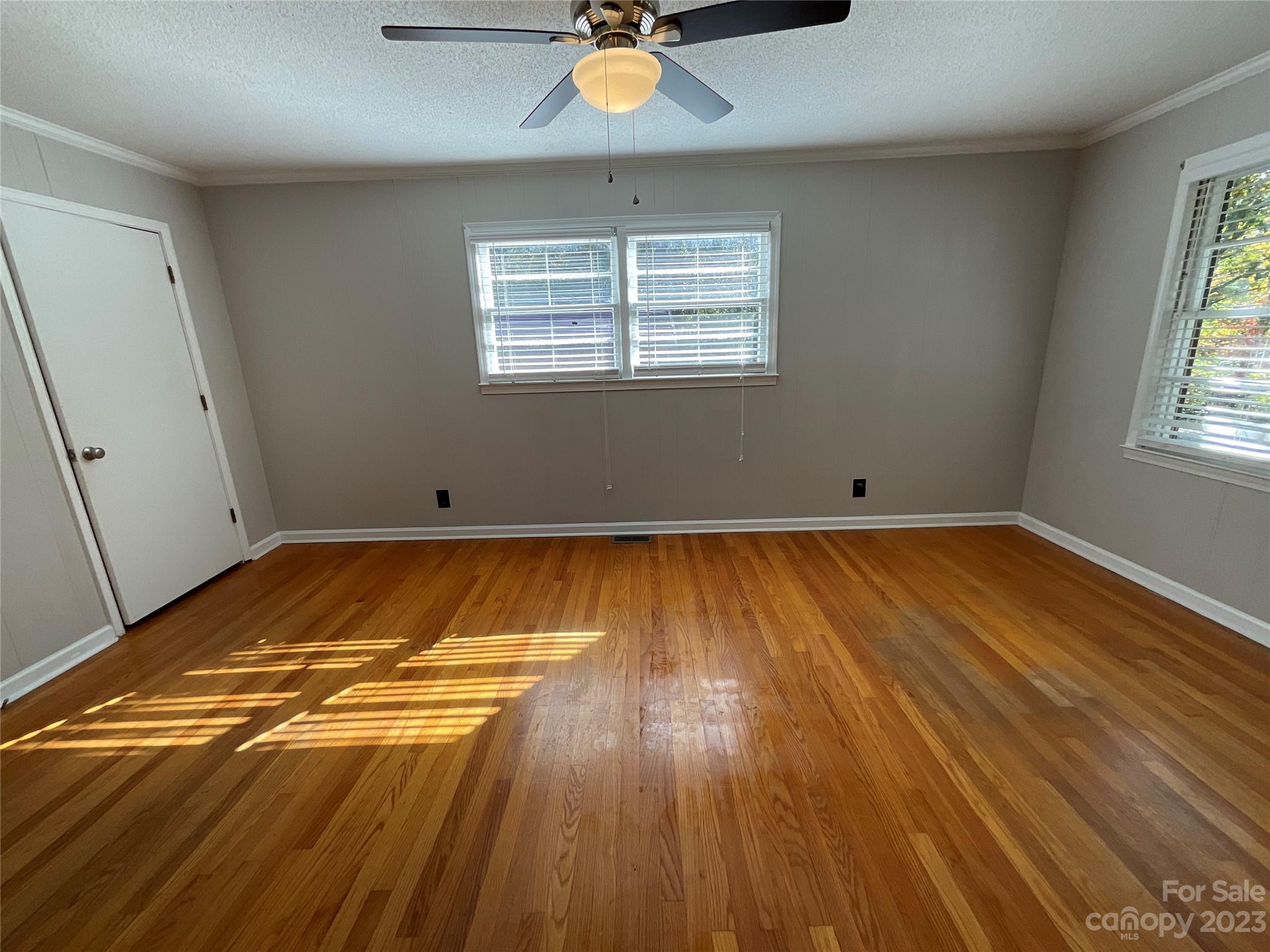 1285 Rainbow Circle Catawba, SC 29704 - Photo 10 of 22 a view of room with window ceiling fan and hardwood floor