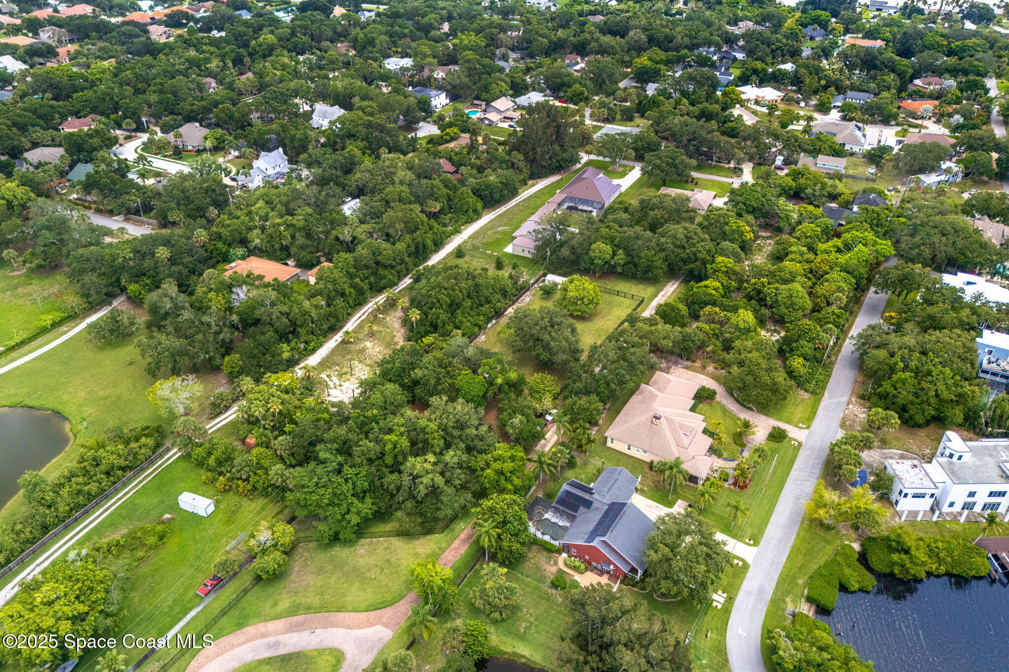 4297 Crooked Mile Road Merritt Island, FL 32952 - Photo 118 of 118 137-web-or-mls-DJI_20250610122324_0068_D