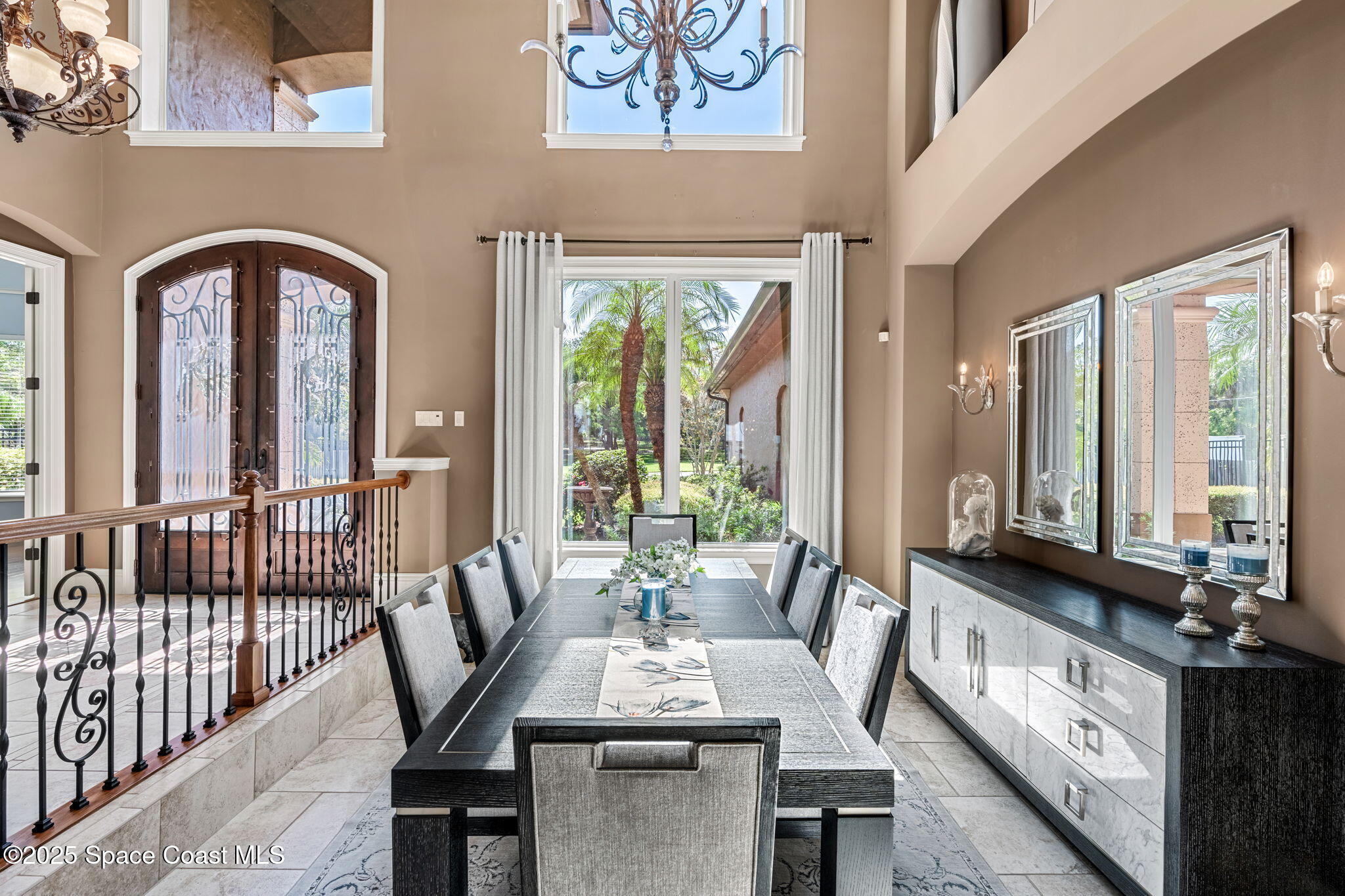 4297 Crooked Mile Road Merritt Island, FL 32952 - Photo 17 of 118 a view of a dining room with furniture window and outside view