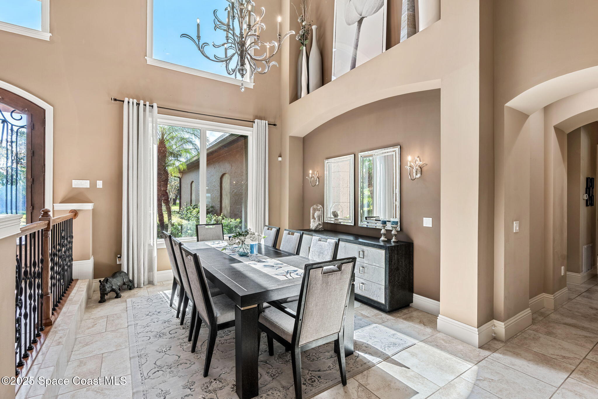 4297 Crooked Mile Road Merritt Island, FL 32952 - Photo 18 of 118 a view of a dining room with furniture window and wooden floor