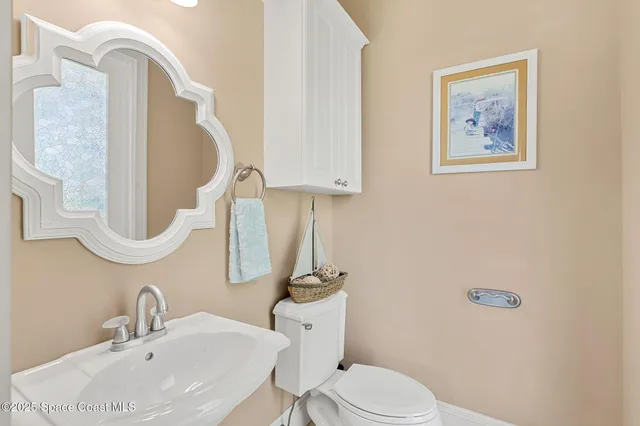 a view of a swimming pool with a yard