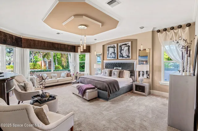 a swimming pool with outdoor seating and yard