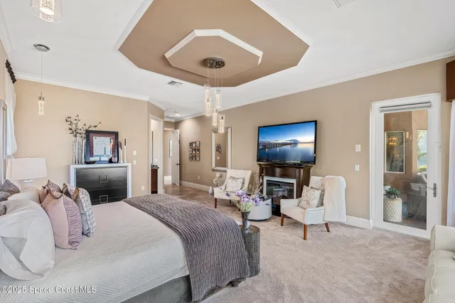 a view of a swimming pool with an outdoor space and seating area