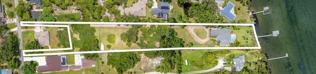 a living room with furniture fireplace and rug