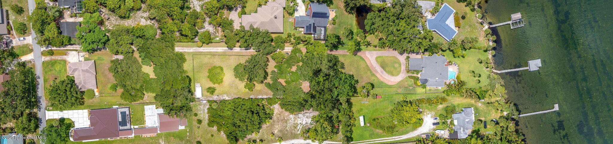 4297 Crooked Mile Road Merritt Island, FL 32952 - Photo 95 of 118 101-web-or-mls-DJI_20250610120511_0030_D