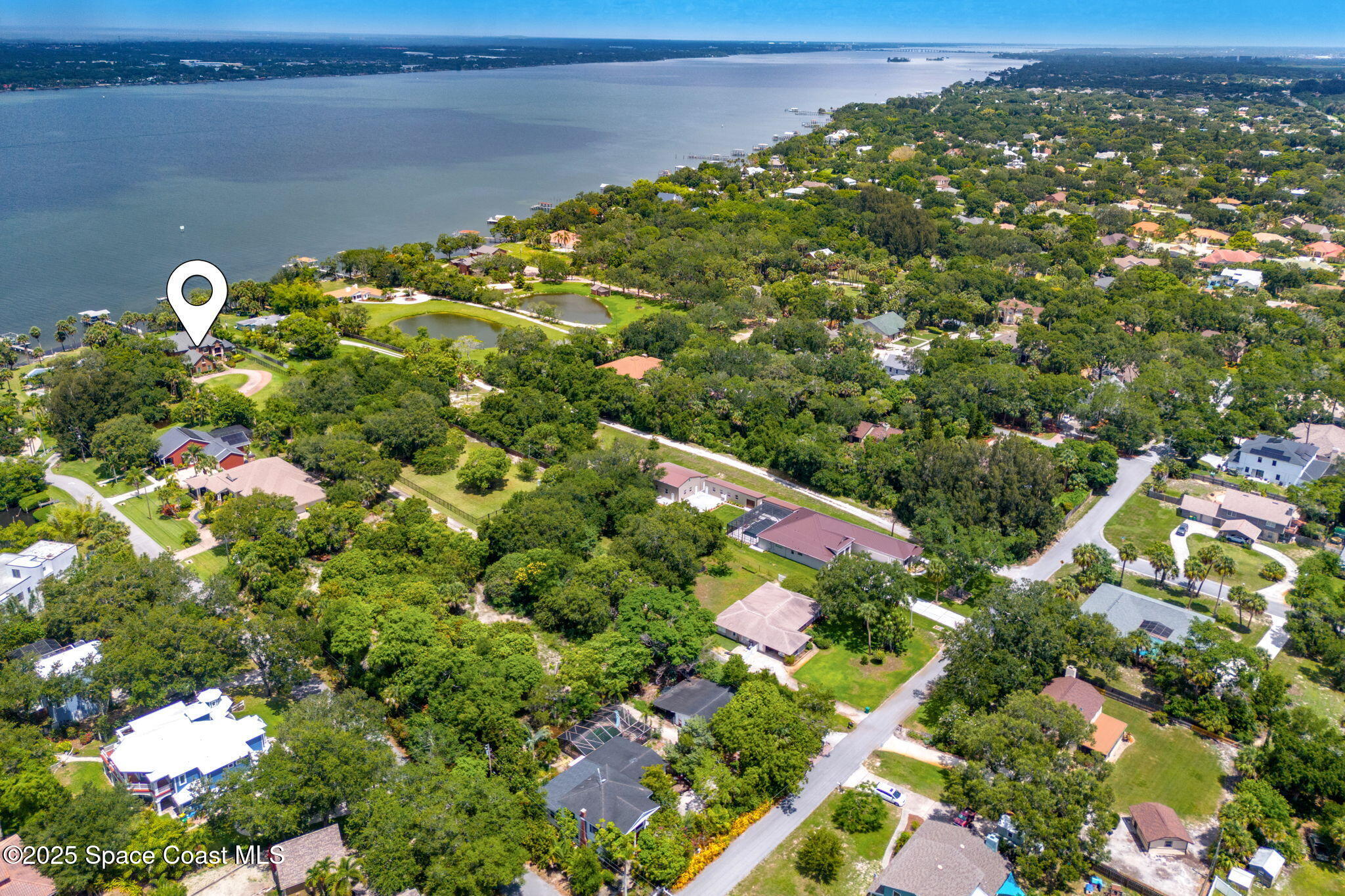 4297 Crooked Mile Road Merritt Island, FL 32952 - Photo 97 of 118 105-web-or-mls-DJI_20250610120902_0042_D