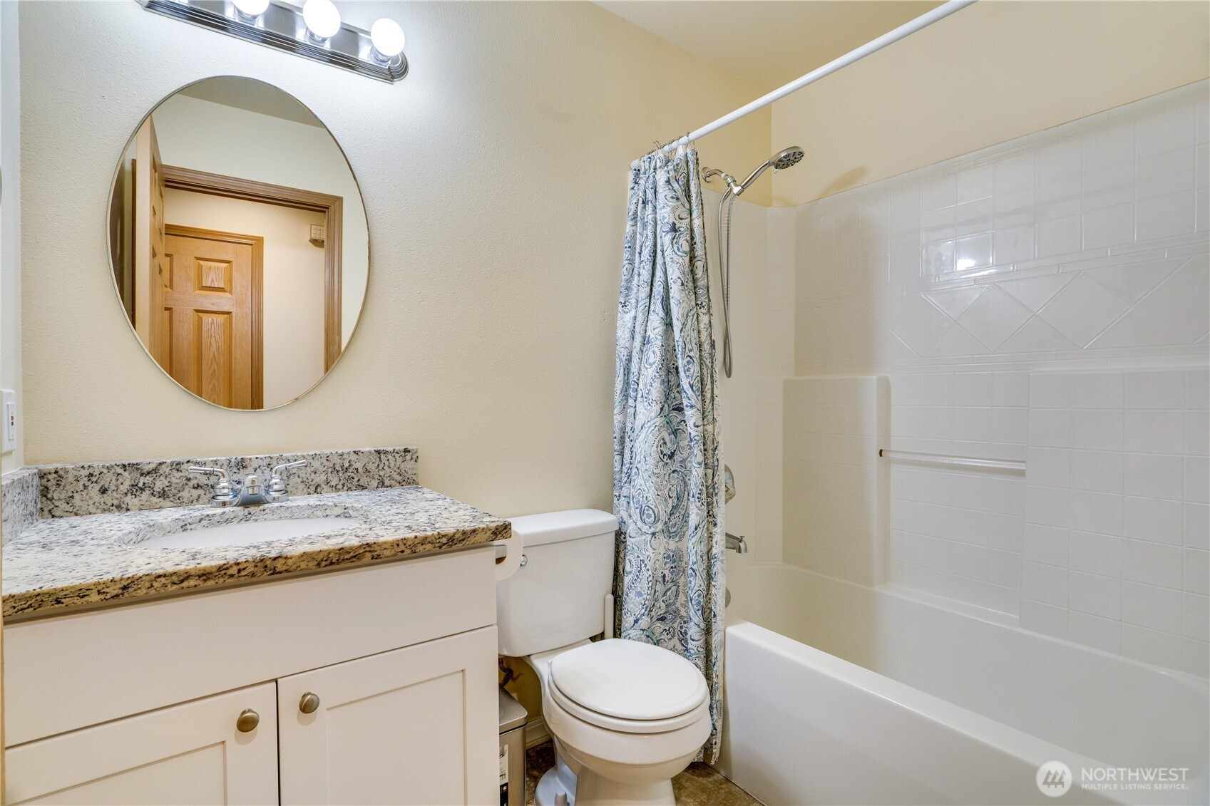 935 Southwest 319th Place Federal Way, WA 98023 - Photo 17 of 26 a bathroom with a toilet sink and a mirror