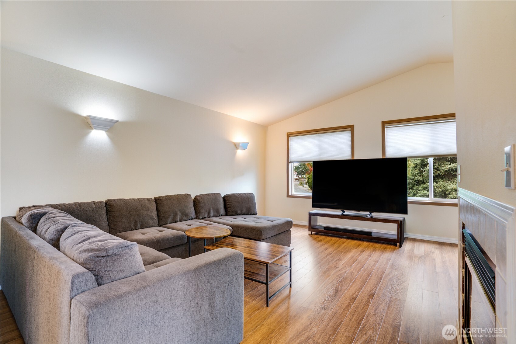935 Southwest 319th Place Federal Way, WA 98023 - Photo 4 of 26 a living room with furniture and a flat screen tv