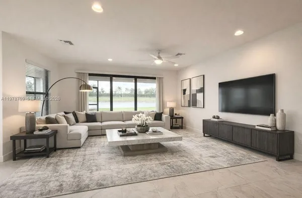 a view of a kitchen with a sink and a stove top oven