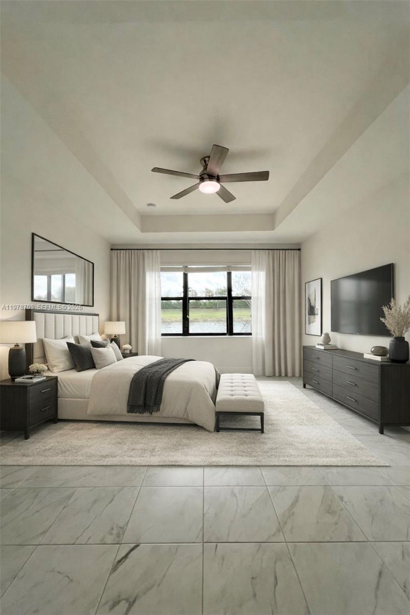 10922 Southwest Meandering Mile Road, Unit 10922 Port St. Lucie, FL 34987 - Photo 30 of 56 a spacious bedroom with a bed and window