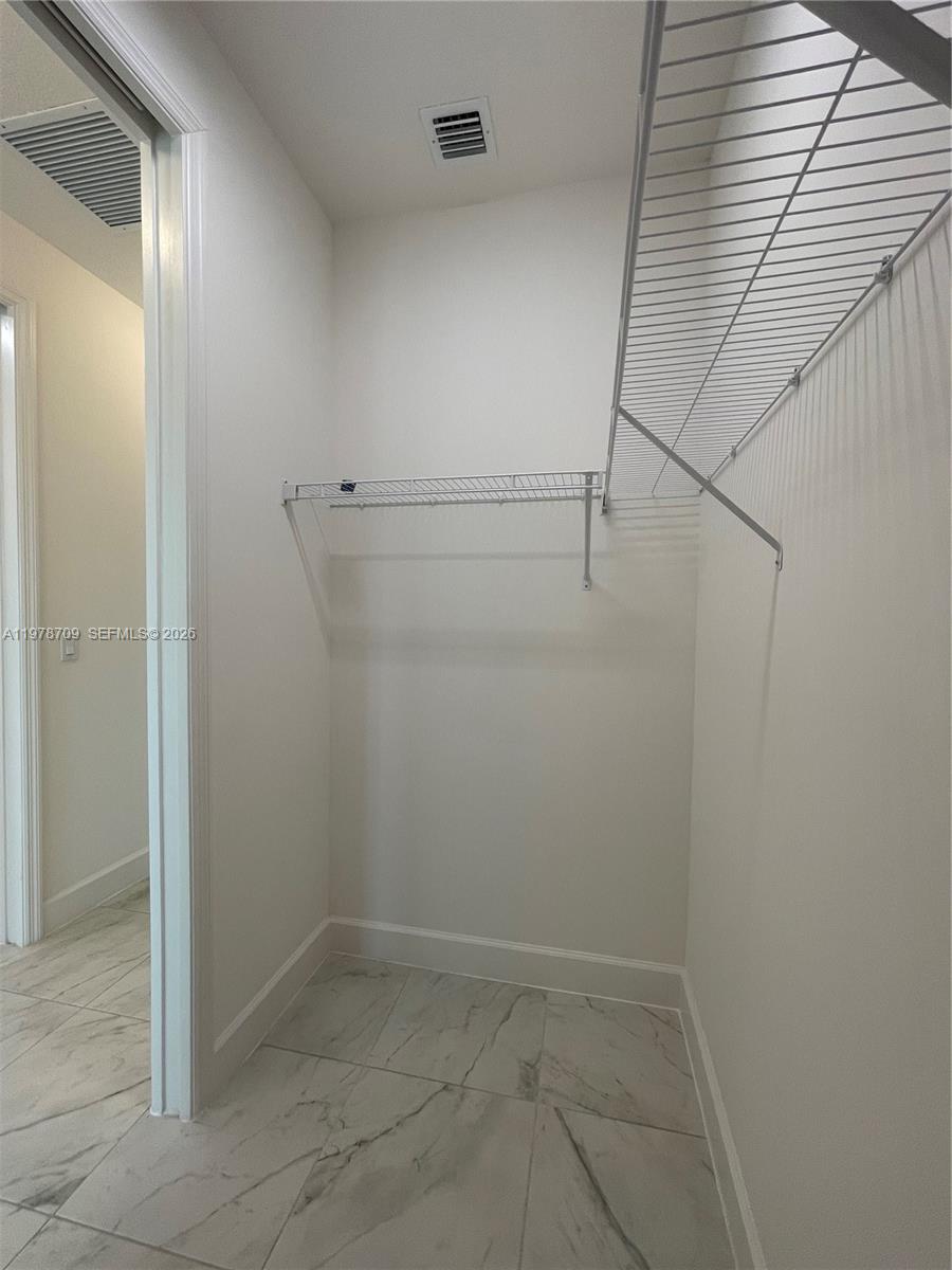 10922 Southwest Meandering Mile Road, Unit 10922 Port St. Lucie, FL 34987 - Photo 32 of 56 a view of small space