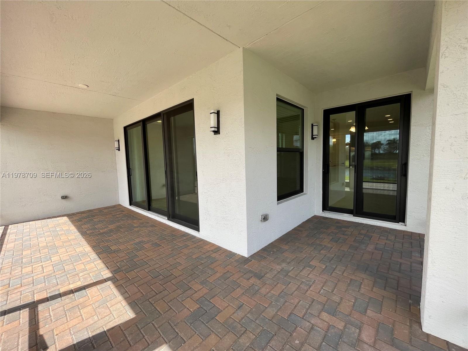 10922 Southwest Meandering Mile Road, Unit 10922 Port St. Lucie, FL 34987 - Photo 41 of 56 a view of an empty room and window