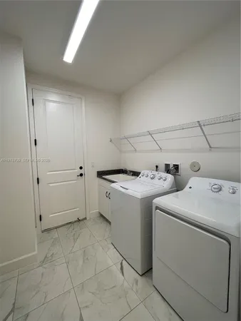 a terrace of a house with outdoor seating