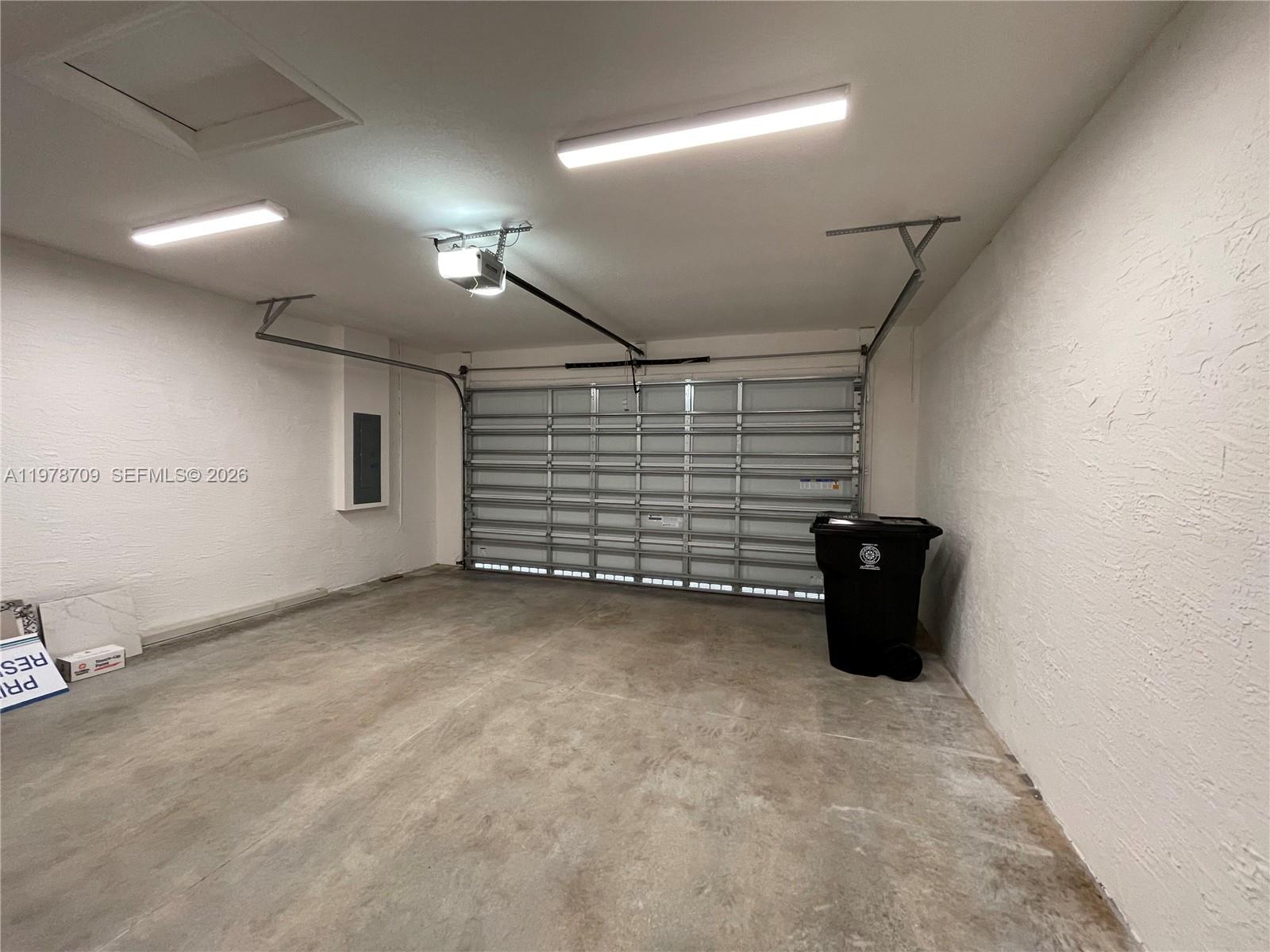 10922 Southwest Meandering Mile Road, Unit 10922 Port St. Lucie, FL 34987 - Photo 44 of 56 a view of an empty room