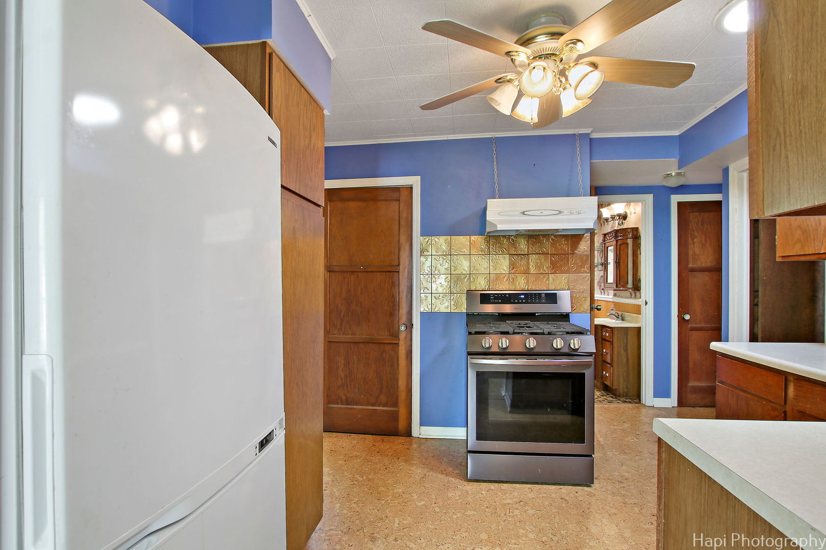 27797 North Forest Garden Road Wauconda, IL 60084 - Photo 11 of 35 a kitchen with stainless steel appliances a stove and a refrigerator
