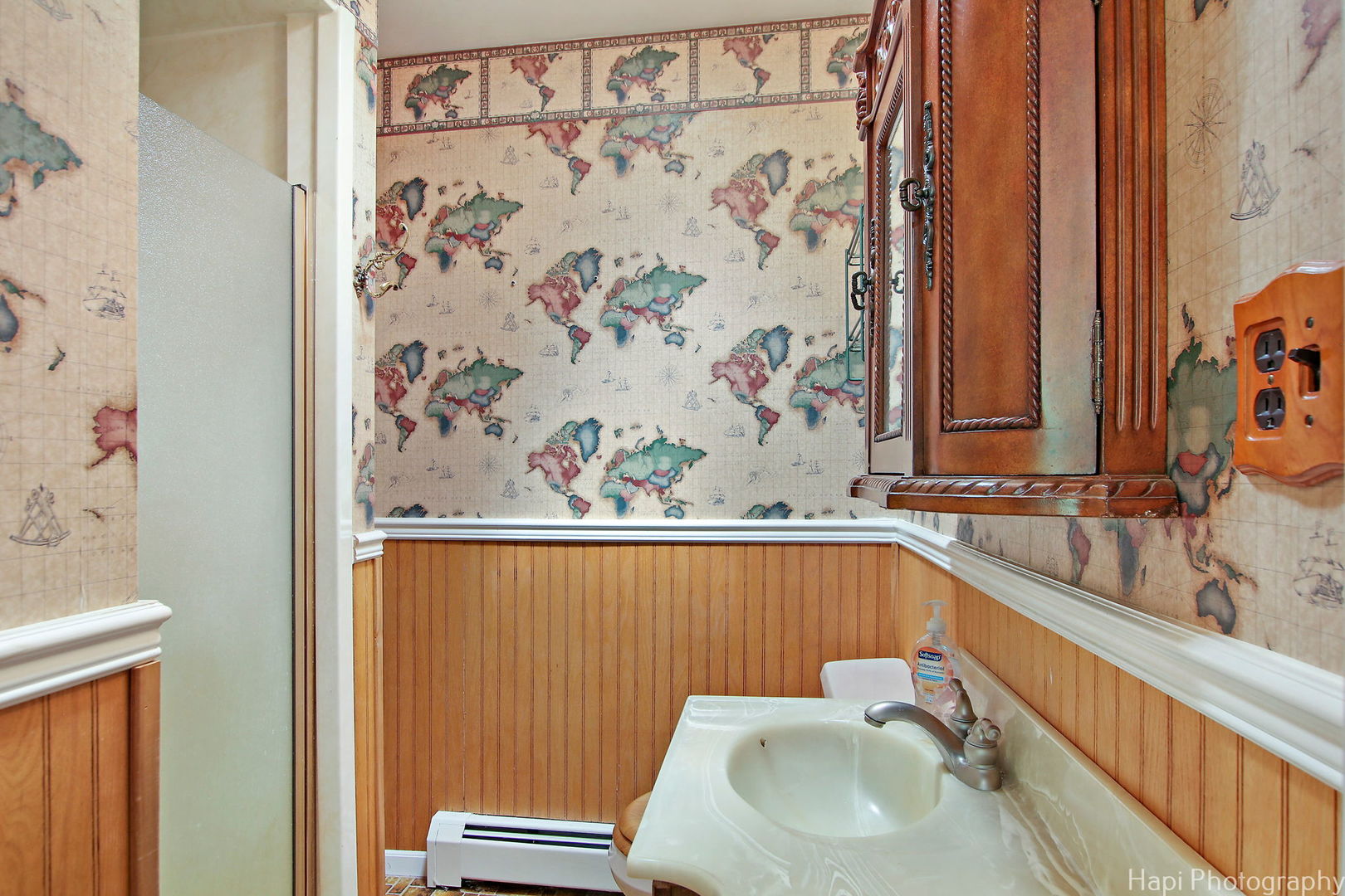 27797 North Forest Garden Road Wauconda, IL 60084 - Photo 16 of 35 a bathroom with a sink and a mirror