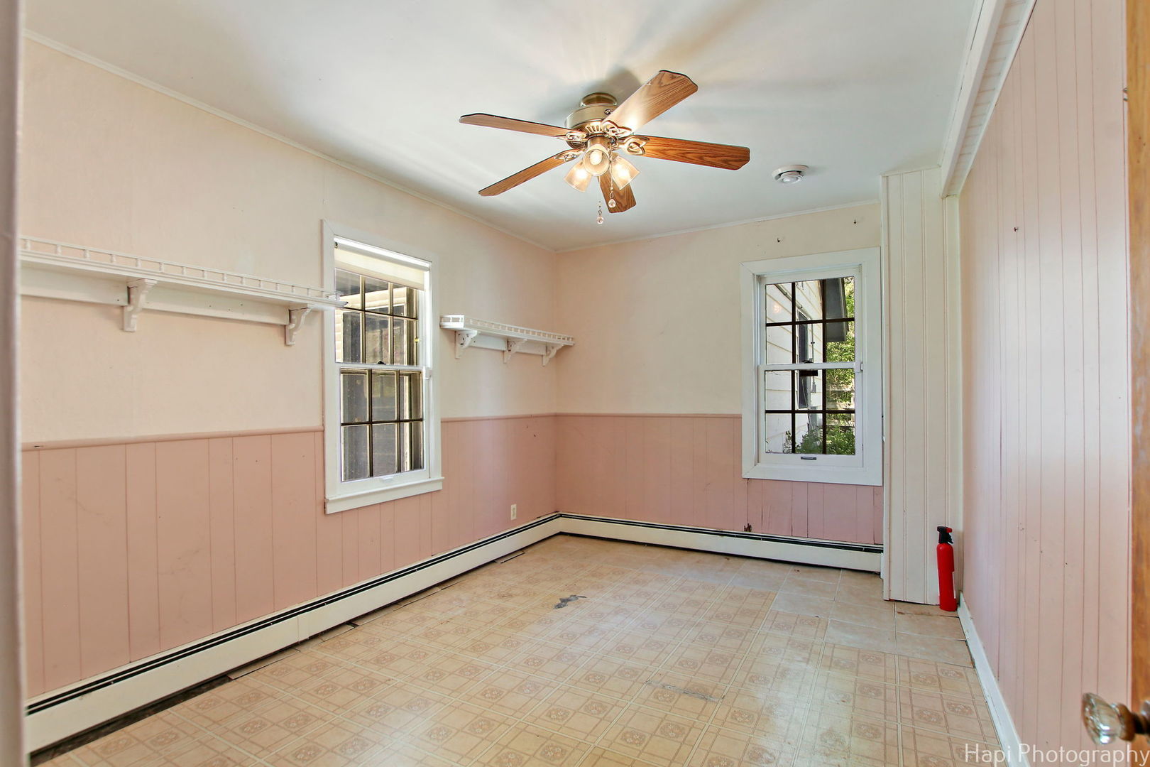 27797 North Forest Garden Road Wauconda, IL 60084 - Photo 17 of 35 an empty room with windows and fan