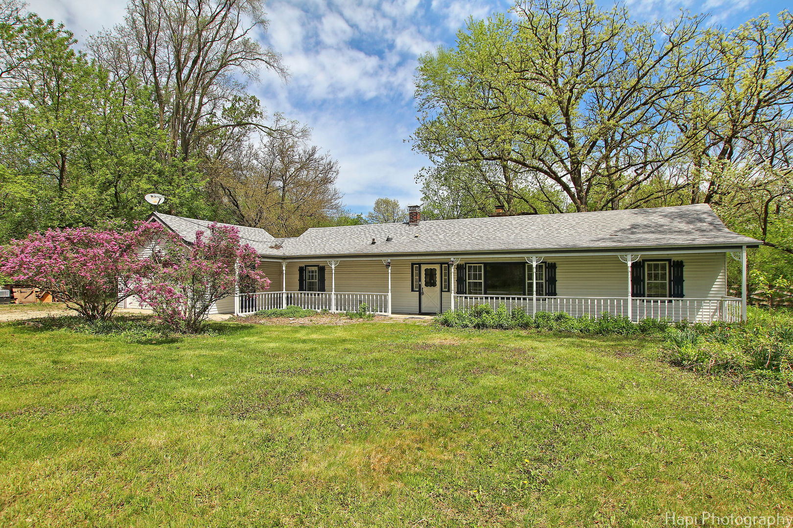 27797 North Forest Garden Road Wauconda, IL 60084 - Photo 2 of 35 a front view of a house with a garden