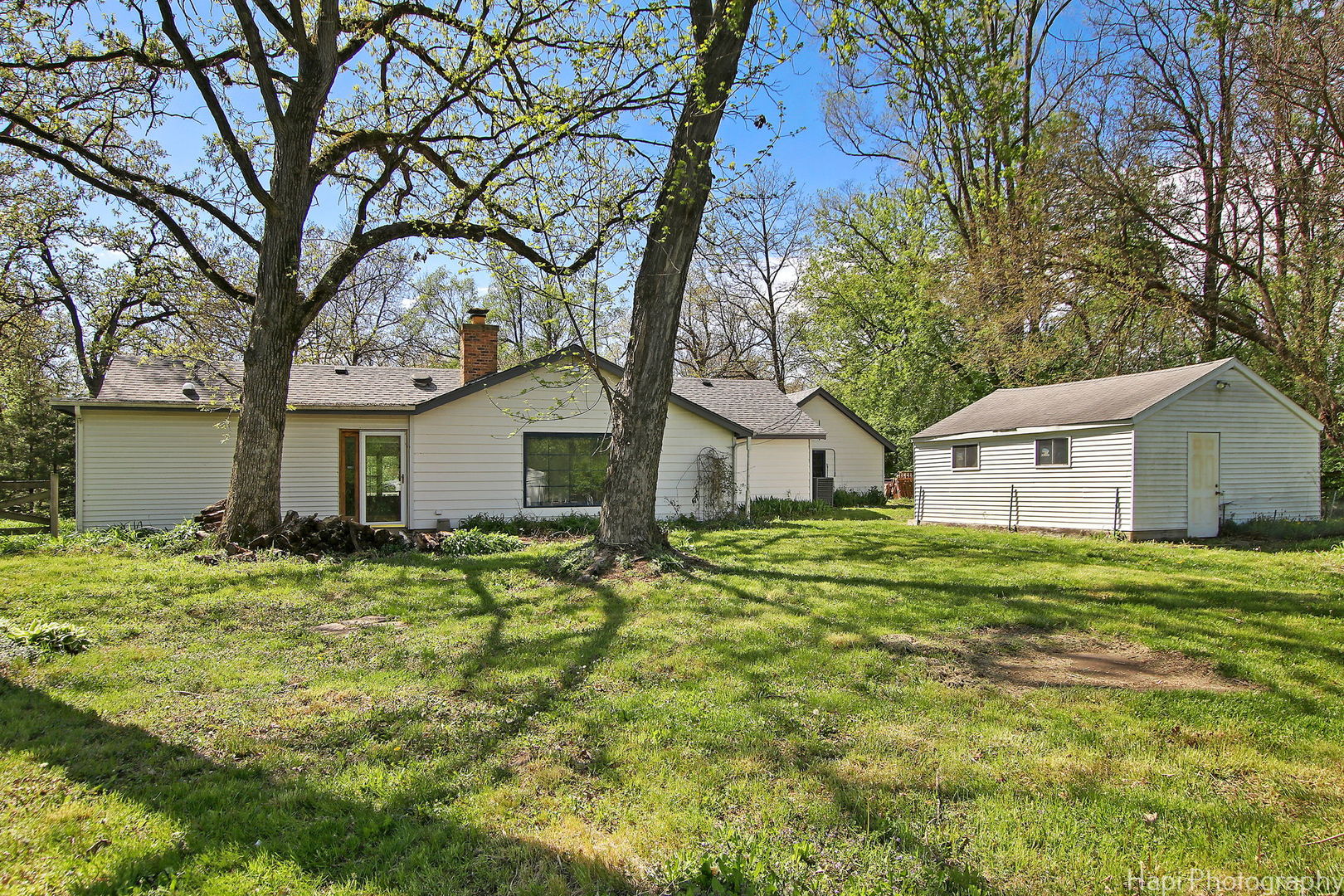 27797 North Forest Garden Road Wauconda, IL 60084 - Photo 29 of 35 a yellow house in middle of the forest