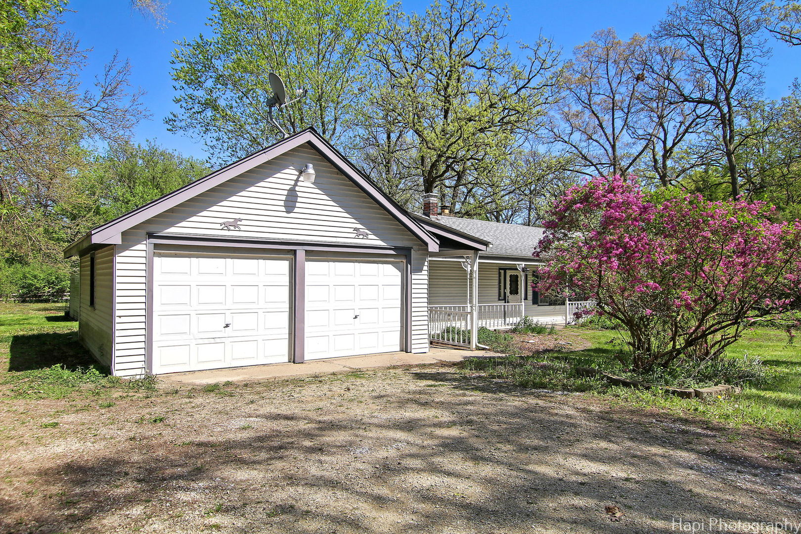 27797 North Forest Garden Road Wauconda, IL 60084 - Photo 30 of 35 a view of a house with a yard and garage