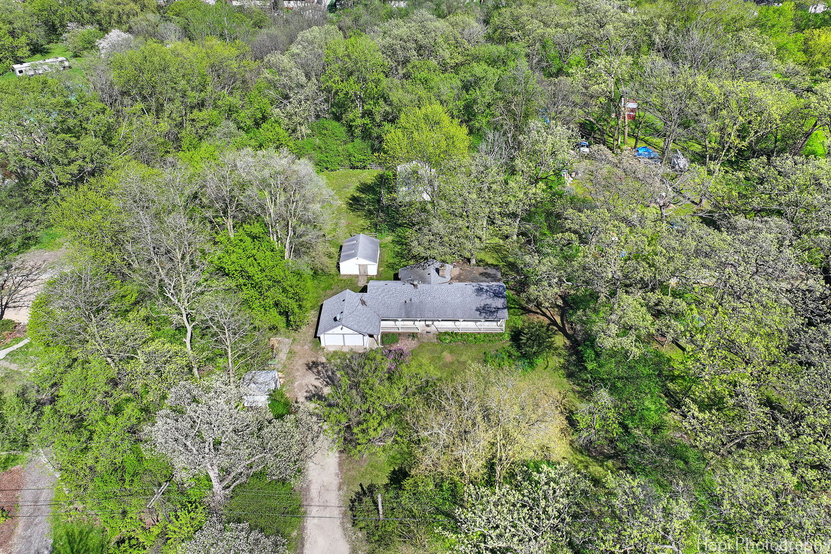27797 North Forest Garden Road Wauconda, IL 60084 - Photo 3 of 35 an aerial view of a house with a yard
