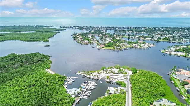 a view of a lake with a yard