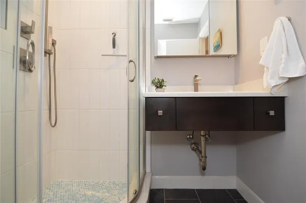 a view of a balcony with wooden floor