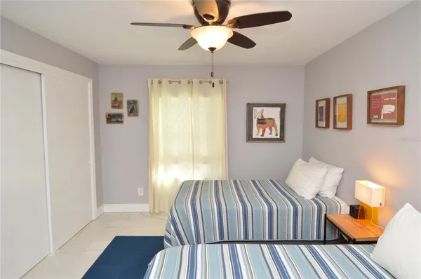 a view of a swimming pool with an outdoor seating