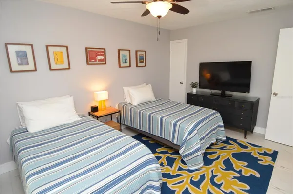 a view of a swimming pool with a lounge chair