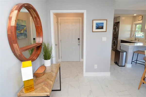 a view of a kitchen with appliances and cabinets