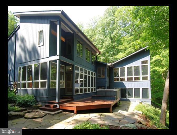 630 Utterback Store Road Great Falls, VA 22066 - Photo 29 of 30 a front view of a house with balcony