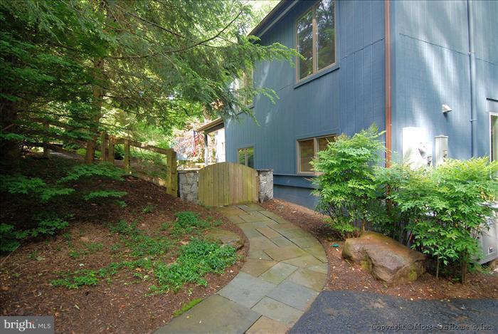 630 Utterback Store Road Great Falls, VA 22066 - Photo 3 of 30 a view of a pathway with a house