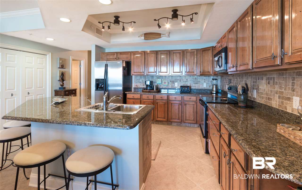 27800 Canal Road, Unit 216 Orange Beach, AL 36561 - Photo 5 of 34 So much counter space and many cabinets!