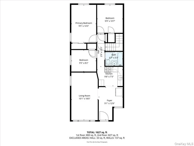 a picture of a bench in front of a wall