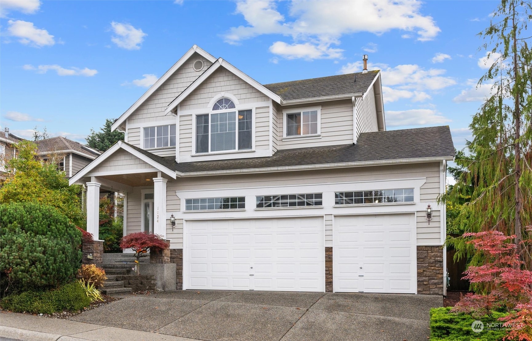1124 184th Place Southeast Bothell, WA 98012 - Photo 1 of 35 a view of a house with a outdoor space