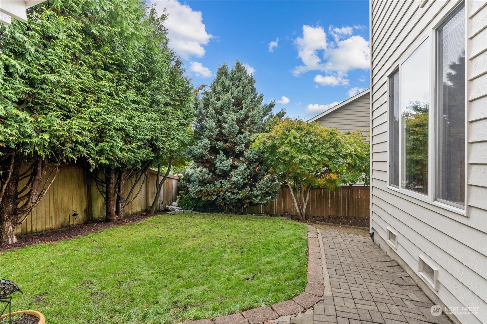 1124 184th Place Southeast Bothell, WA 98012 - Photo 34 of 35 a view of a house with a backyard