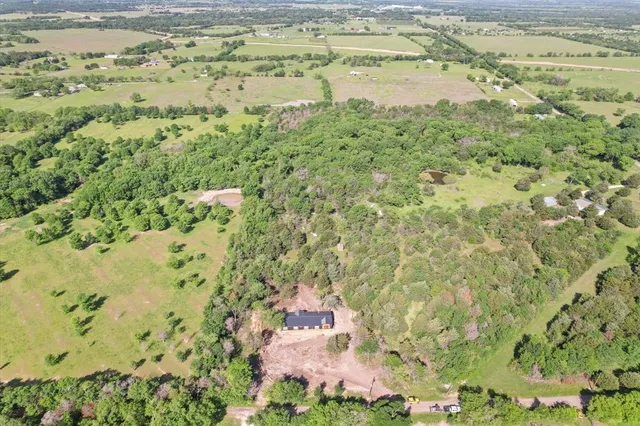 a view of a yard with an outdoor space