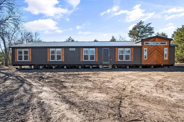 a front view of house with yard