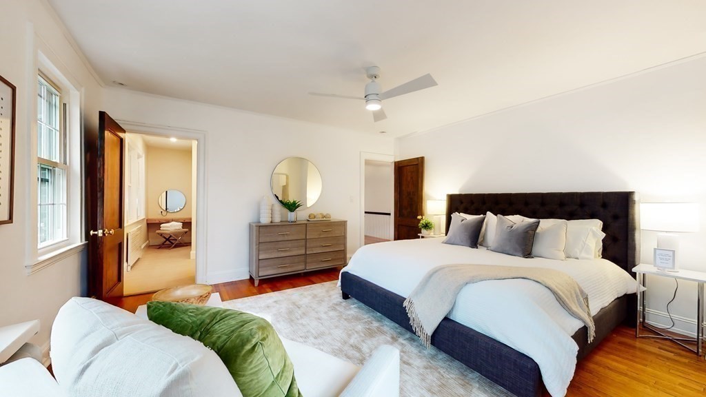 380 Jamaicaway Boston, MA 02130 - Photo 13 of 30 a bedroom with a large bed and a large mirror