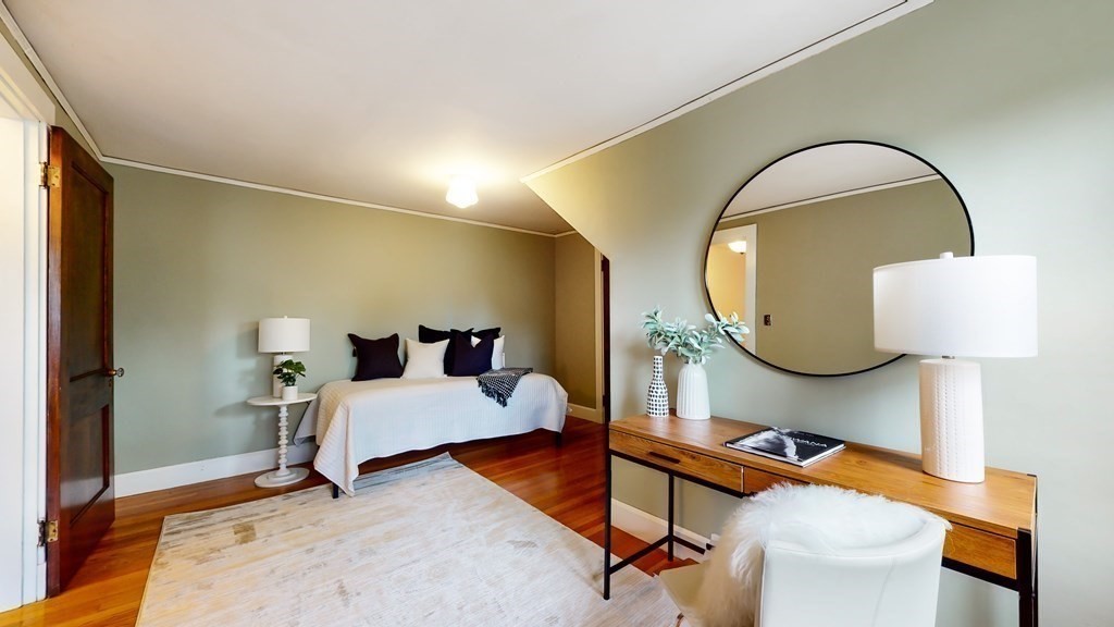 380 Jamaicaway Boston, MA 02130 - Photo 18 of 30 a bed room with a bed and a mirror