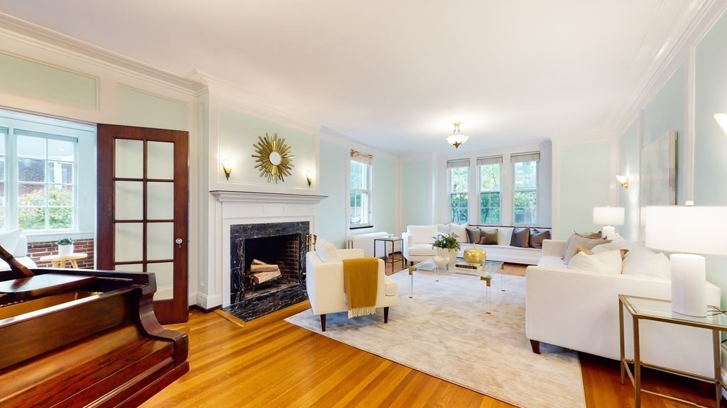 380 Jamaicaway Boston, MA 02130 - Photo 2 of 30 a living room with furniture and a fireplace
