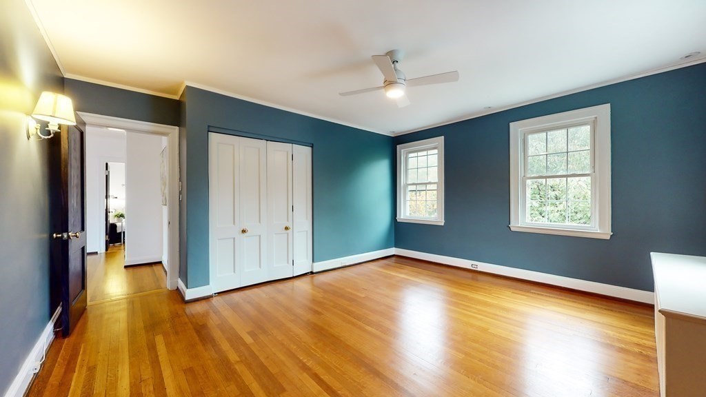 380 Jamaicaway Boston, MA 02130 - Photo 22 of 30 wooden floor in an empty room with a window