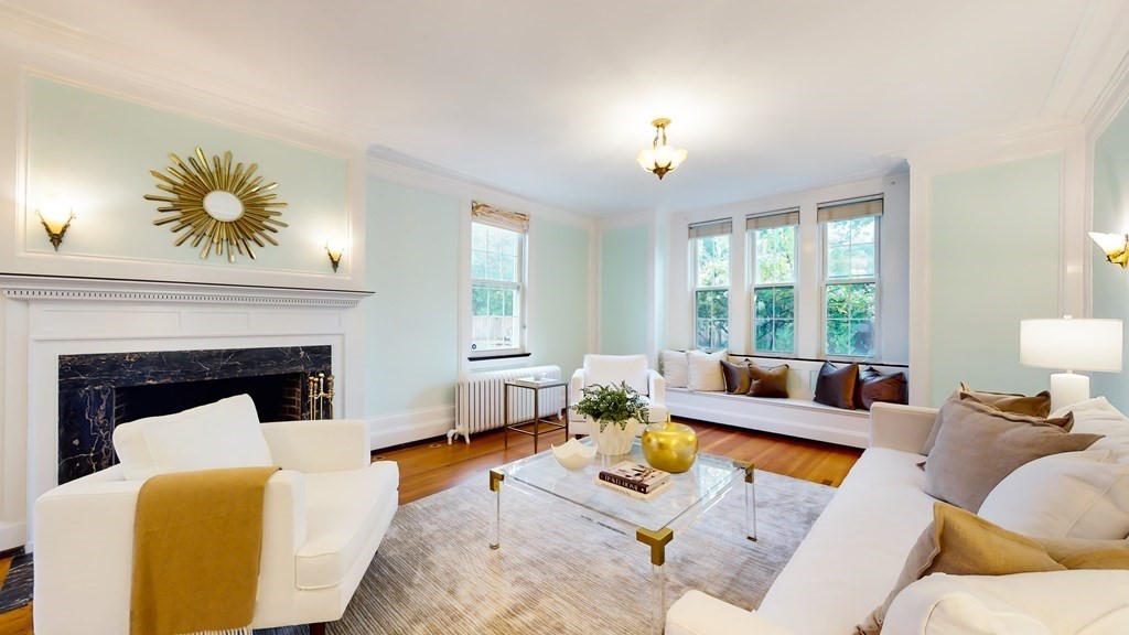 380 Jamaicaway Boston, MA 02130 - Photo 3 of 30 a living room with furniture and a fireplace