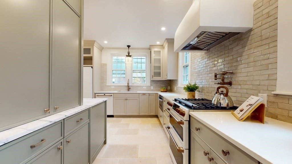 380 Jamaicaway Boston, MA 02130 - Photo 8 of 30 a kitchen that has a sink and a stove
