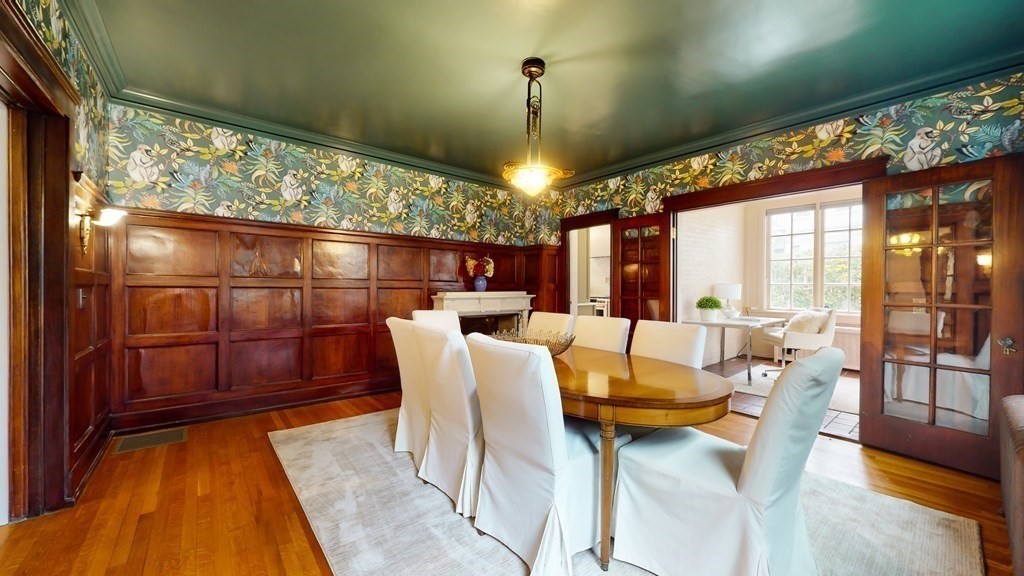 380 Jamaicaway Boston, MA 02130 - Photo 9 of 30 a view of a dining room with furniture wooden floor and chandelier