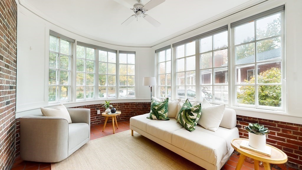 380 Jamaicaway Boston, MA 02130 - Photo 10 of 30 a living room with furniture and large windows