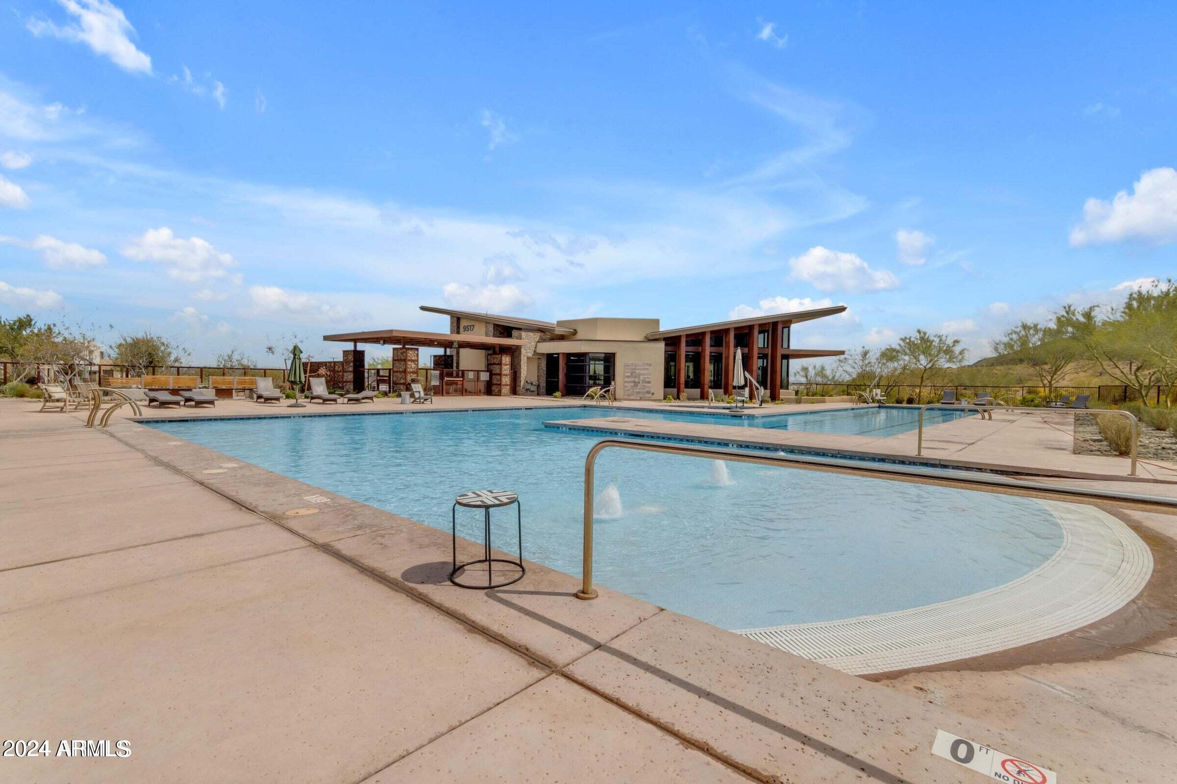 812 East Summerside Road Phoenix, AZ 85042 - Photo 7 of 64 a view of a swimming pool with an outdoor seating