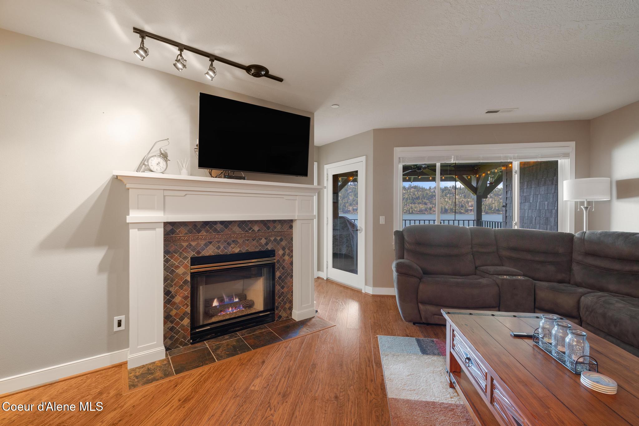 4549 South Arrow Point Drive, Unit 207 Harrison, ID 83833 - Photo 16 of 60 Gas Fireplace